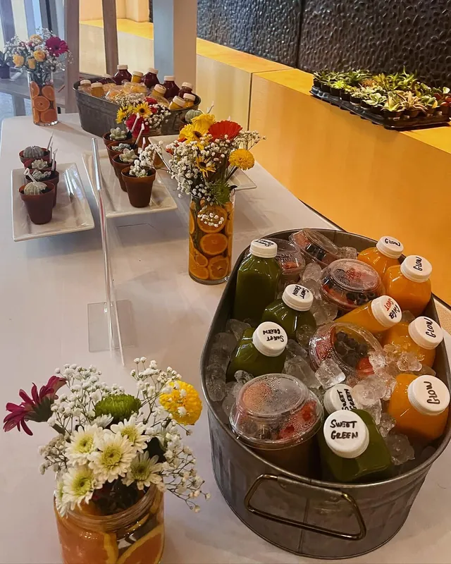 LYNAY juices and fruit cups on ice at a corporate event